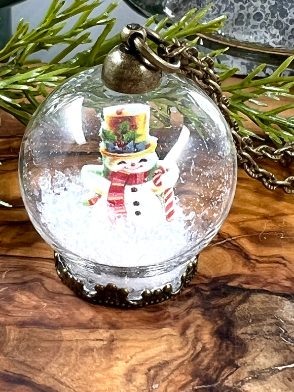 Frosty with Yellow Hat Snow Globe Necklace