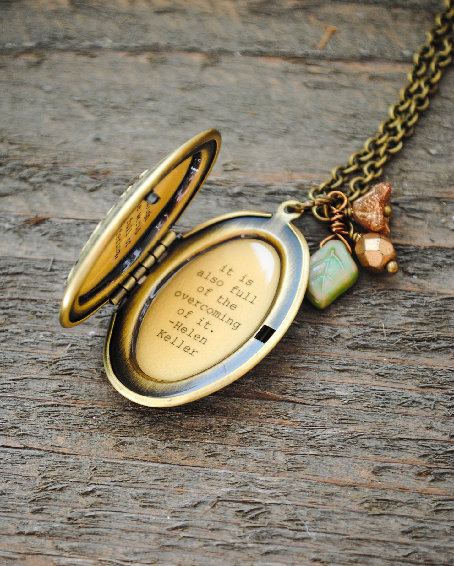 Although the world is full of suffering it is also full of overcoming of it Helen Keller - Quote Locket